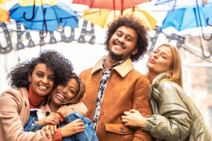 Group of multiracial friends having fun together outdoor