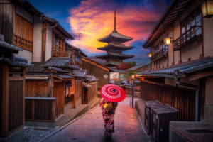 Asian women wearing traditional japanese kimono among at Yasaka